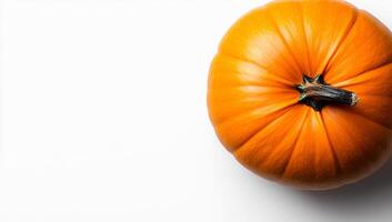 Orange pumpkin on white bg. A vibrant orange pumpkin rests on a white background, showcasing its smooth surface and distinctive stem. photo