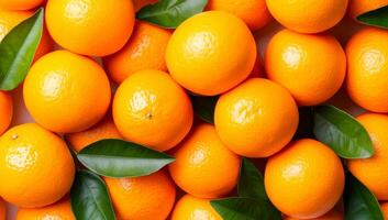 Fresh oranges with green leaves. Vibrant oranges with glossy skins and green leaves are arranged artfully on a light background, showcasing freshness. photo