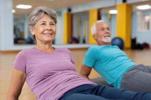 Active Seniors Gym Workout and Fitness. Healthy Couple Exercising Together. Wellness and Active Lifestyle for Retirement photo