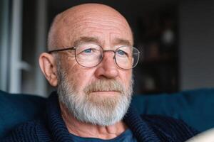 Portrait of a Thoughtful Elderly Man A Pensive Gaze and the Weight of Years. A Captivating Image Exploring Themes of Age, Wisdom, photo