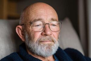 Pensive Elderly Man Portrait A Contemplative Gaze. This image evokes a sense of calm reflection, capturing the subtle details of a photo