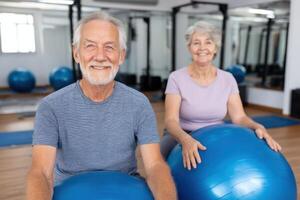 Active Seniors Fitness and Wellness in Retirement. A Couple Enjoys a Pilates Workout at the Gym, Focusing on Balance and Strength photo