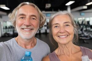 Active Senior Couple Smiling at the Gym, Promoting Healthy Aging and Fitness. Wellness, Retirement, and Exercise. photo