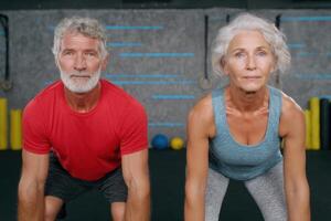 Active Senior Couple Fitness Gym Workout, Healthy Lifestyle, Exercise, Strength Training, Wellness, Retirement, Motivation photo