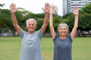Joyful Elderly Couple Exercising Outdoors An Image of Active Retirement, Health, and Wellness photo