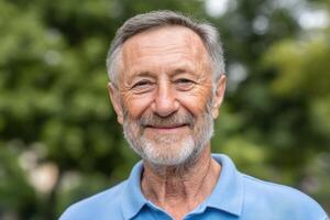 Portrait of a Happy Senior Man Smiling Outdoors. A joyful elderly gentleman in nature, radiating positivity and serenity. This ima photo
