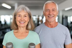 Active Senior Couple Fitness and Wellness in Retirement. A portrait of a healthy, smiling older man and woman working out at the photo