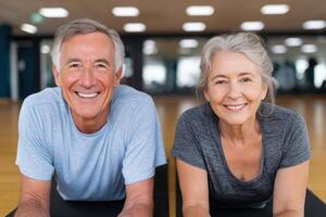 Active Senior Couple Smiling at the Gym Healthy Aging and Fitness Goals. Wellness, Exercise, and Wellbeing for Older Adults. photo