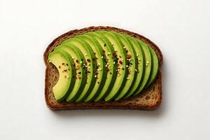 Avocado toast with sliced avocado on white background photo