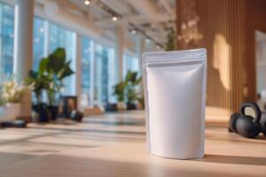 A white bag sitting on a table in front of a window photo