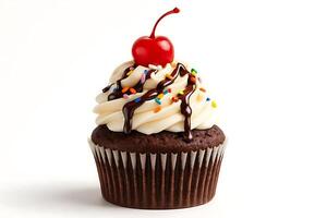 A chocolate cupcake with a cherry on top photo