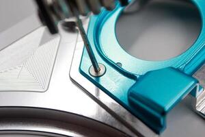 close up of hex key being used by mechanic, good for background or article photo