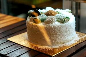 Cakes and pastries in shop, cafe, bakery fridge display for sale photo