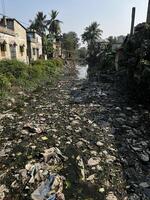The river is full of garbage. photo