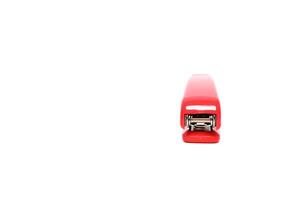 Front View of a Red Stapler Isolated on a White Background, Office Stationary photo