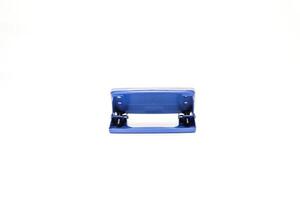 Close-up studio shot of a blue hole puncher on a white background for office use photo