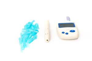 Diabetes testing kit with glucose meter, lancing device, and disposable lancets for monitoring blood sugar levels photo
