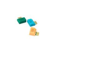 A colorful assortment of glucose test strips displayed on a clean white backdrop ready for medical use photo