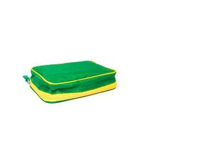 Green and Yellow Rectangular Travel Bag on White Background for Packing Essentials photo