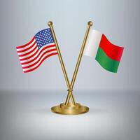 USA and Madagascar table flag relation, with gradient background vector