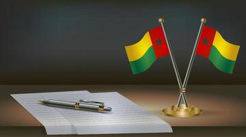 Guinea Bissau table flag on a dark gradient color background table. Illustration vector