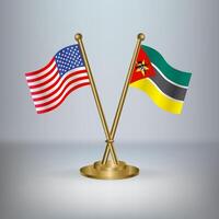 USA and Mozambique table flag relation, with gradient background vector