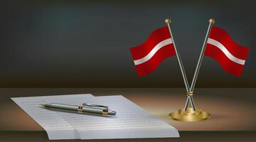 Latvia table flag on a dark gradient color background table. Illustration vector