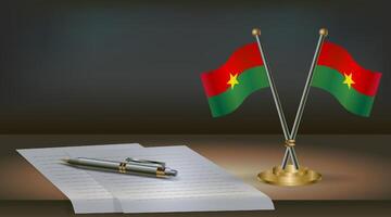 Burkina table flag on a dark gradient color background table. Illustration vector