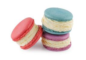 Colorful macaron cakes. Small french muffins. Colorful macarons on a white background with clipping path.. photo