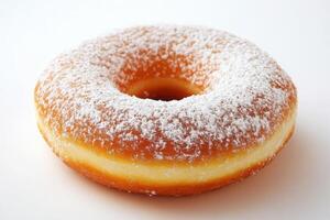 Delicious powdered sugar donut isolated on white background photo