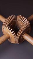 Looping animation of a mechanical construction made of wooden gears. video