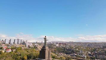 Yerevan, Armenia - 19th october, 2024 - The statue of Mother Armenia. Mother Armenia Monument aerial close circular view. In background street, buildings Victory park In Yerevan video
