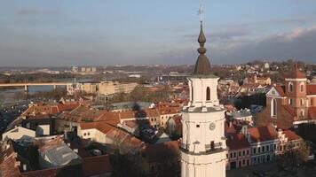 Kaunas, Lithuania - 16th november, 2024 - aerial zoom in view The Town Hall Kaunas on sunset. Town Hall Square - the heart of the Old Town. The structure dates from the 16th century video