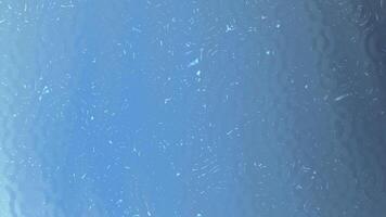 Blue frosted glass texture perfect for backgrounds, web design, print materials, and product packaging to add a sleek modern look. video