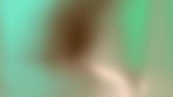 Blurry abstract green, brown, beige gradient ideal for backgrounds, designs, and textures with a modern touch and soothing colors palette. video