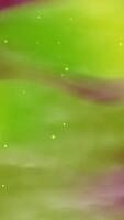 Abstract green and purple blurry background with lights, suitable for vibrant and modern design projects, backgrounds, and artistic concepts. video