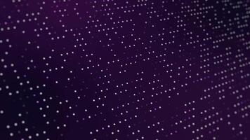 Visual display of animated dots creating dynamic patterns in purple hues video