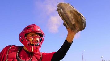 A Dynamic and Energetic Baseball Catcher in Action, Surrounded by Dust Clouds and Excitement video
