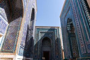 Samarkand, Uzbekistan - august 13, 2023-Particular of Shakhi Zinda necropolis, a famous mausoleum complex in Samarkand during a sunny day. photo