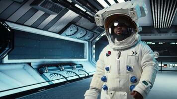 Astronaut wearing helmet inside space station preparing for mission outside, on hostile planetary habitat. Man in starship beginning landing procedures on extraterrestrial planet, camera A video