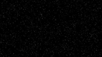 Heavy falling snow flakes on black background. heavy and fast snowfall animation. video
