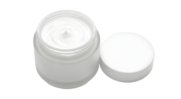 Close up of a small clear jar filled with white cream next to its white lid on transparent background png