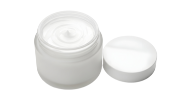 A clear jar filled with white cream and a white lid resting beside it on a transparent background png