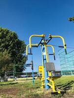 Outdoor fitness equipment for people with disabilities in park photo