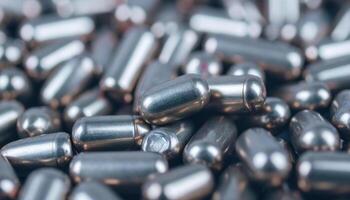 Close-Up of Shiny Metallic Capsules on a Surface for Engine and AI Insights photo