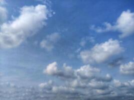 Clouds on the blue sky photo