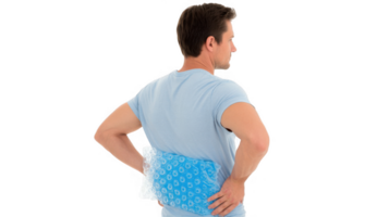 Man relieving back pain with ice pack on transparent background png