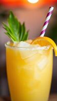 Refreshing citrus cocktail garnished with an orange slice and a sprig of greenery. photo