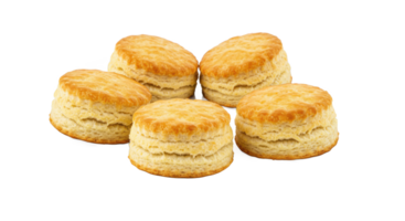 A delectable stack of golden brown biscuits arranged artfully on a neutral surface ready to be enjoyed png