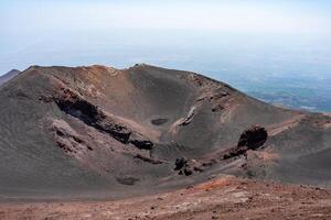 Black and red colorful volcanic terrain panorama photo